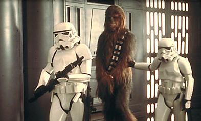 Chewbacca handcuffed with Stormtroopers