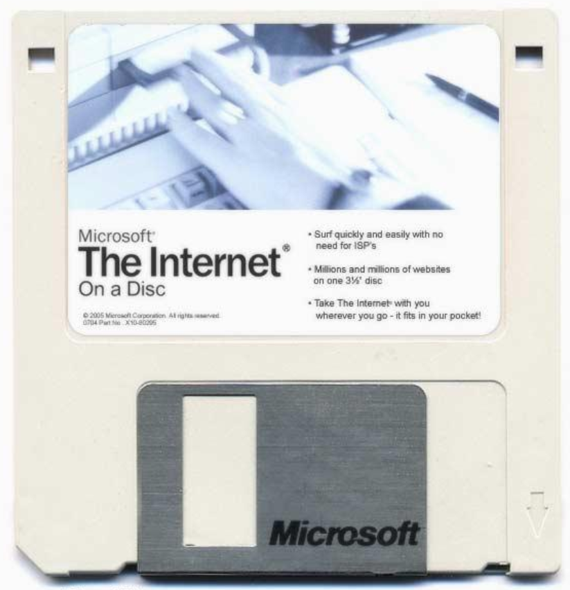 Picture of a floppy disk with an official-looking Microsoft product label with the text: The Internet / On a Disc / * Surf quickly and easily with no need for ISPs / * Millions and millions of websites on one 3½'' disc / * Take The Internet with you wherever you go - it fits in your pocket!